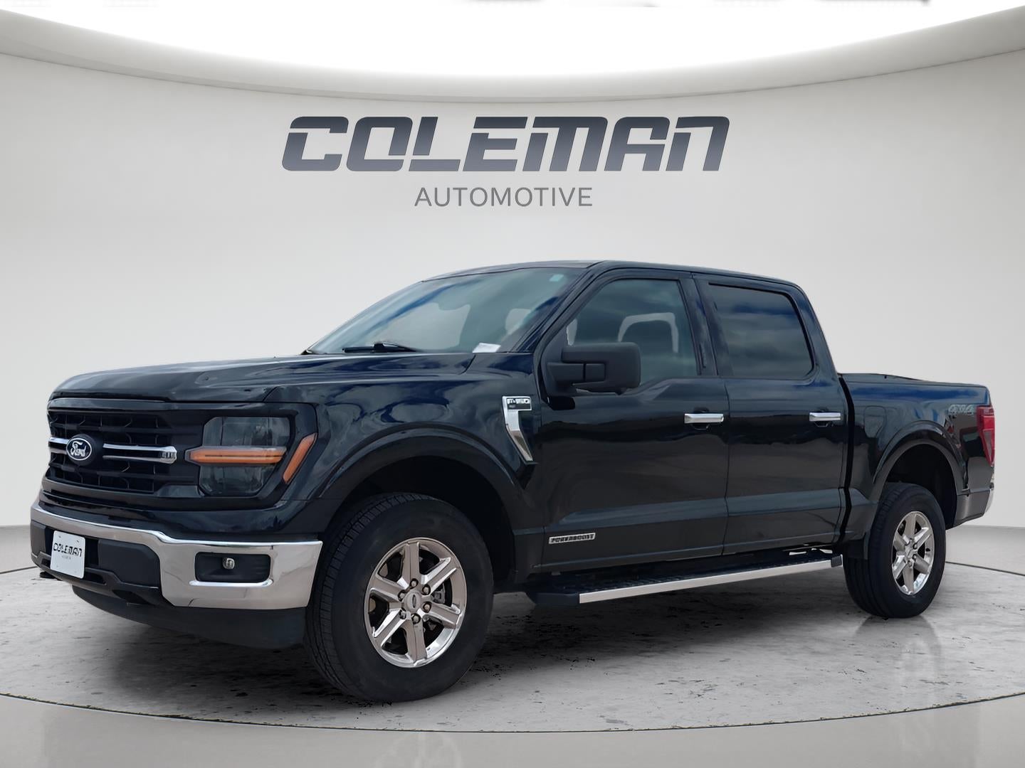 2024 Ford F-150 XLT in Agate Black — front three-quarter view