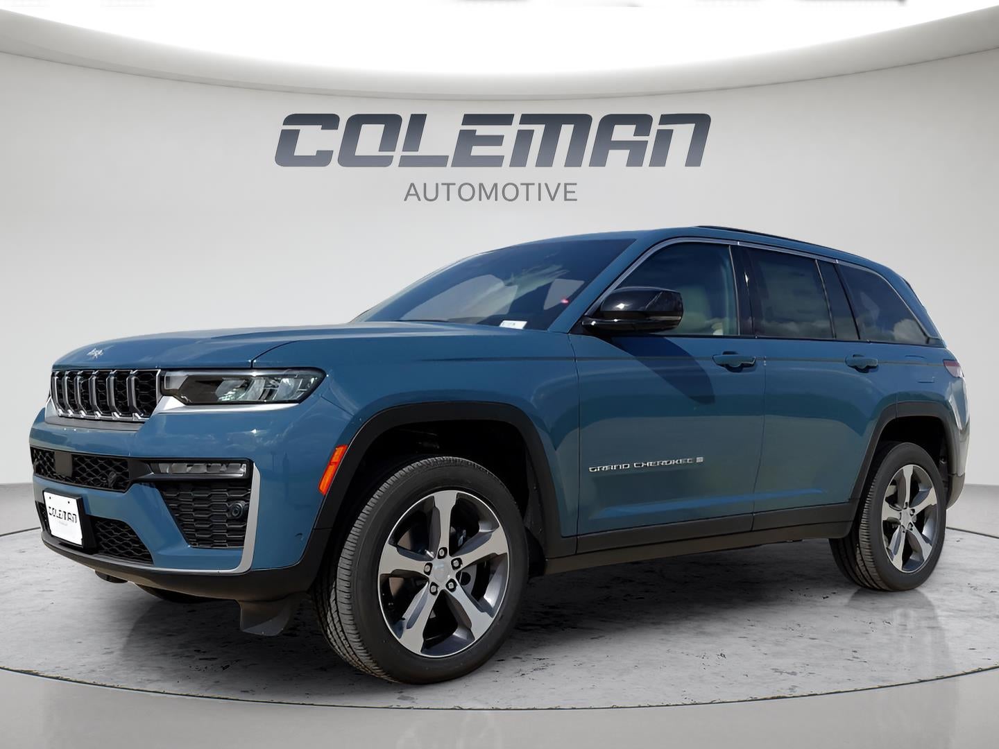 2026 Jeep Grand Cherokee Limited in Steel Blue Exterior Paint — front three-quarter view
