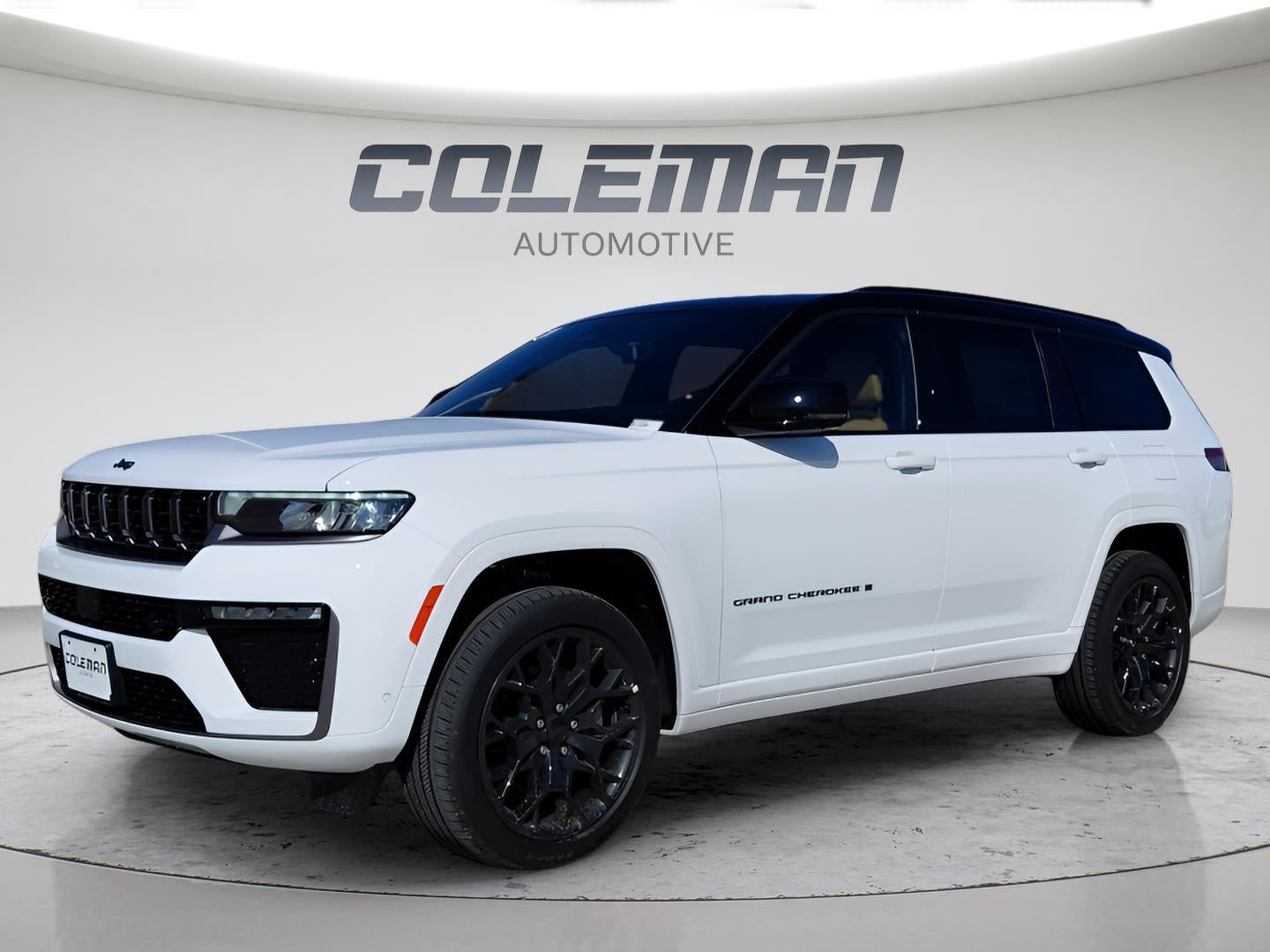 2026 Jeep Grand Cherokee L Summit in Bright White Clear-Coat Exterior Paint — front three-quarter view