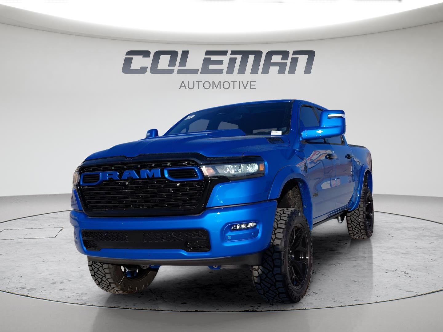 2026 RAM 1500 Big Horn in Hydro Blue Pearl-Coat Exterior Paint — front three-quarter view