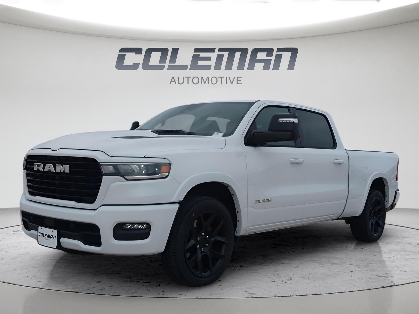 2026 RAM 1500 Laramie in Bright White Clear-Coat Exterior Paint — front three-quarter view